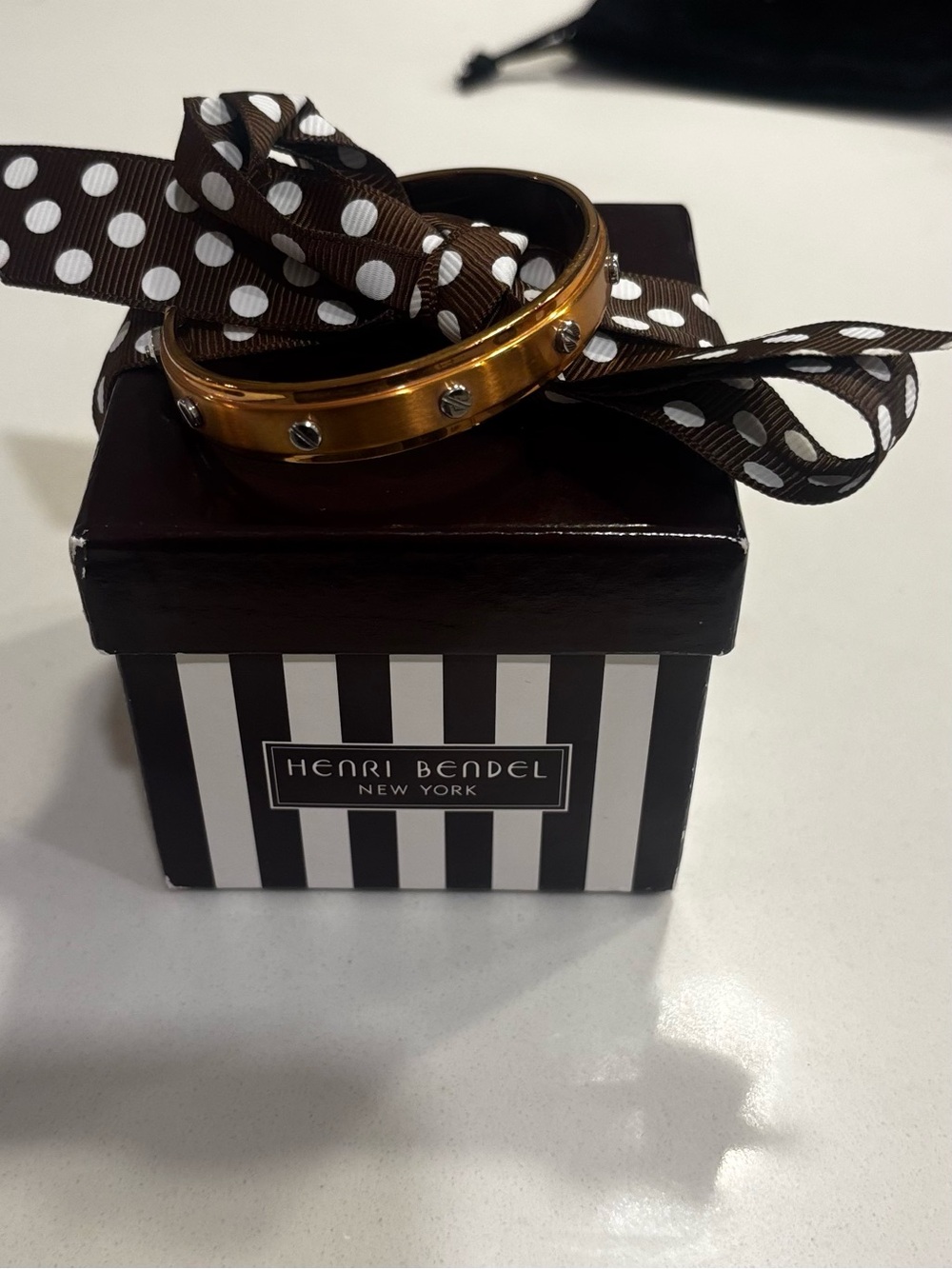 Henri Bendel rose Gold and Black Bangle with Clear Crystal Studs